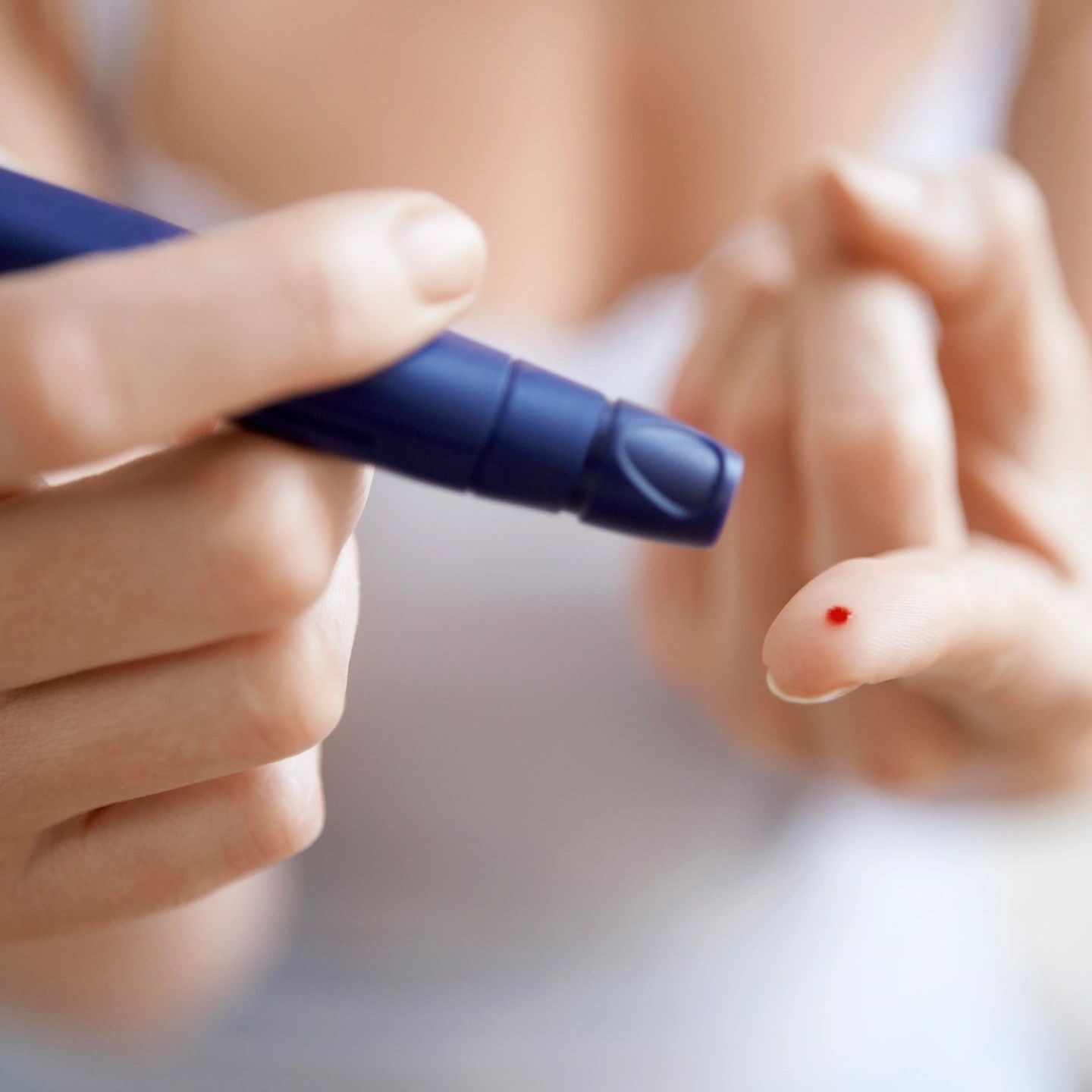 Diabetic Checking Blood Glucose